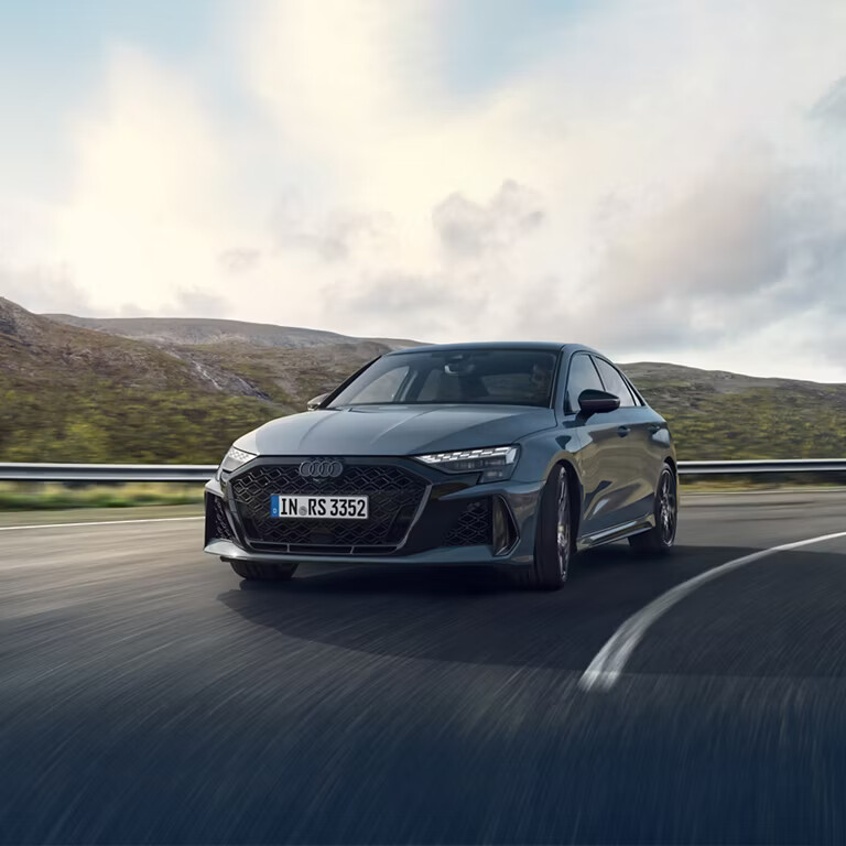 Sharpened proportions, RS design elements and expressive details. The new Audi RS 3 Sedan in the RS-specific paint finish Kemora grey, metallic.