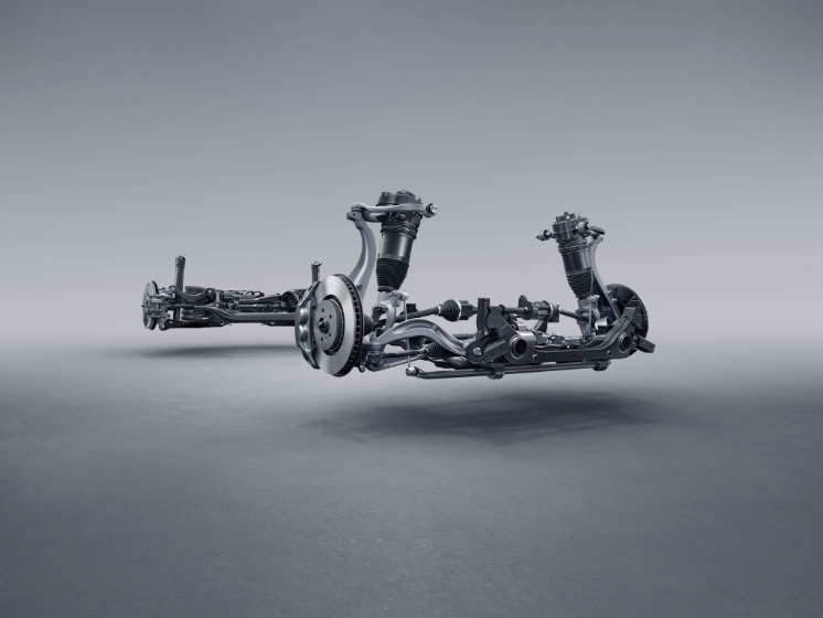 Adaptive ride height and damping, speed & mode-based adjustment, smooth and composed ride.