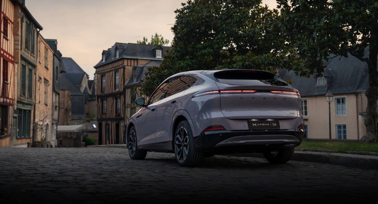 Fastback silhouette with long front overhang, short rear overhang, and clean side sculpting delivers coupe-like dynamism.