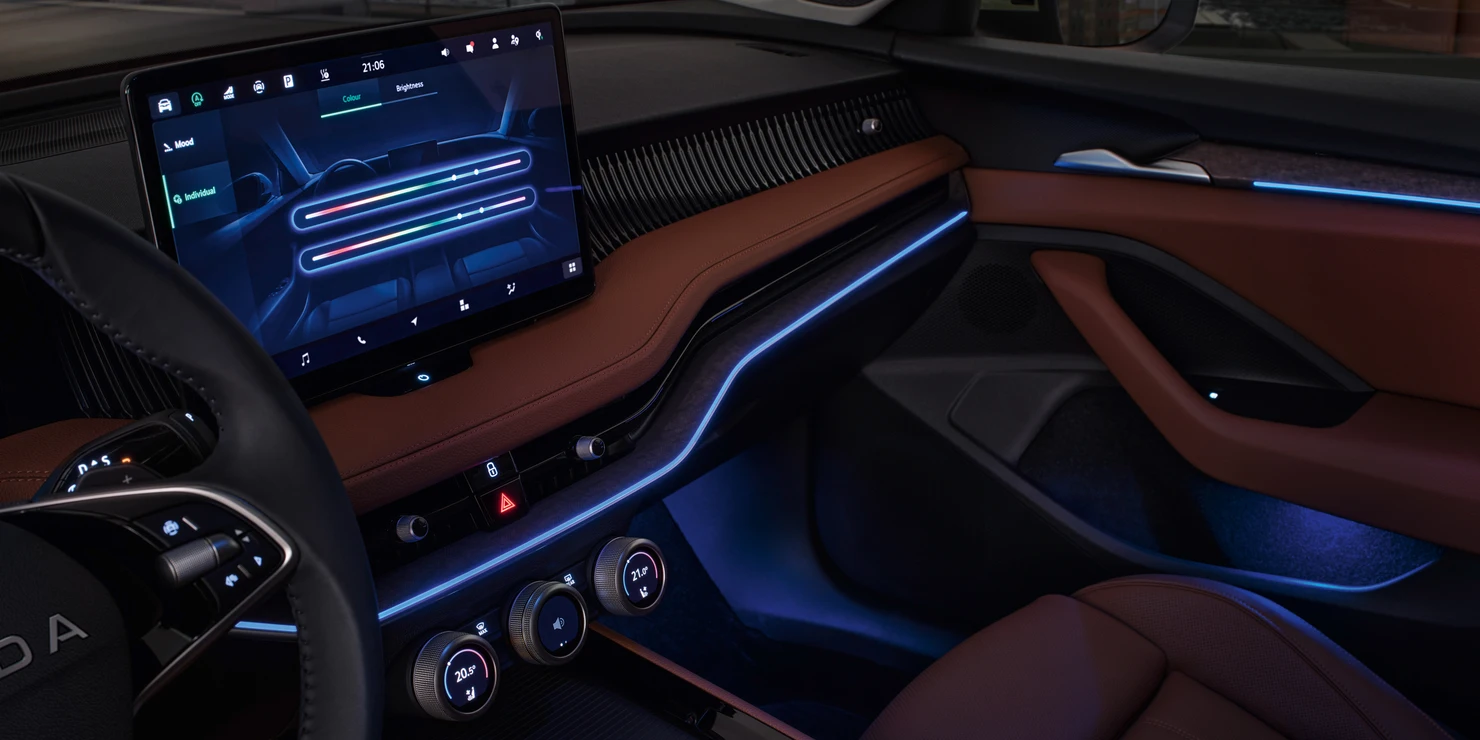 The dashboard, featuring decorative outlines and adjustable ambient lighting, evokes a plush and exciting mood.
