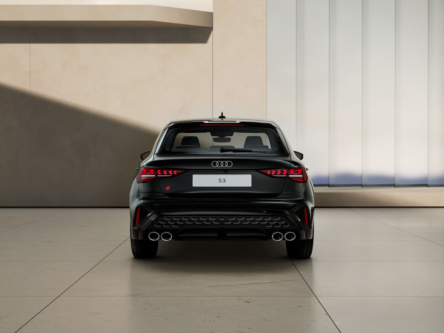 The wide diffuser, vertical reflectors as well as other sporty looking design elements make the new Audi S3 Sportback appear even wider and more self confident from behind. The performance exhaust system and S roof edge spoiler emphasize the dynamic appearance.