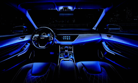 The surrounding cockpit with ice-blue ambient light creates an interior environment full of sense of technology.