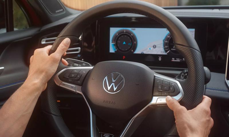 Offering a multifunction steering wheel with haptic buttons.