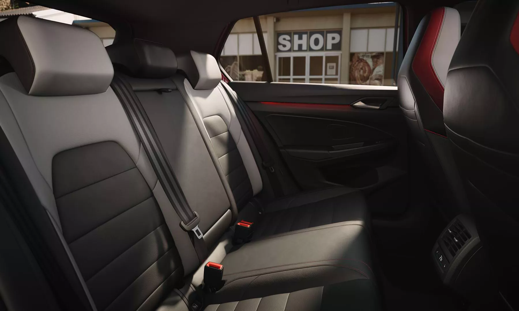 The GTI look is visible in every corner of the interior. While the premium sport seats in the front are covered in durable fabric in “Scale Paper” design, the hallmark red accents of the GTI design are not only visible on the leather steering wheel but also on the front textile floor mats that come in a complementary color scheme.