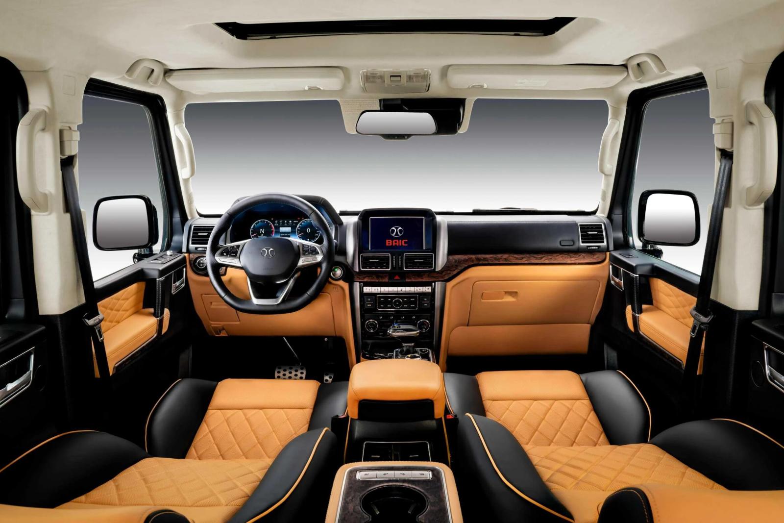 Suede-covered roof and pillars, Nappa leather seats Chrome plating interior, wood grain trim.