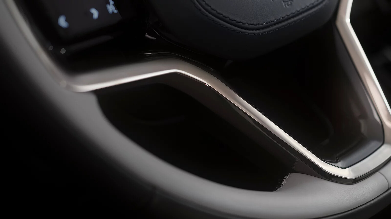 Moonlight Chrome detailing provides visual contrast, with the sophisticated and subtle finish found on the center console, vent surrounds, steering wheel, and air vent sliders.