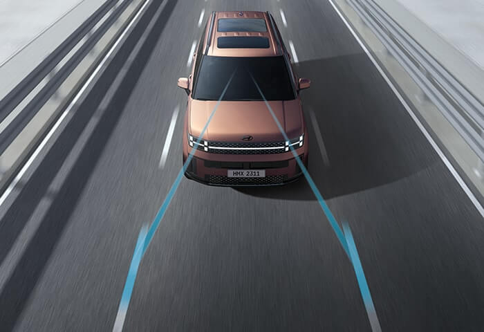 Lane Following Assist 2 (LFA 2) helps center the vehicle in the lane. The control performance has been improved, and
the steering actuator control method has changed from torque control to steering angle control.