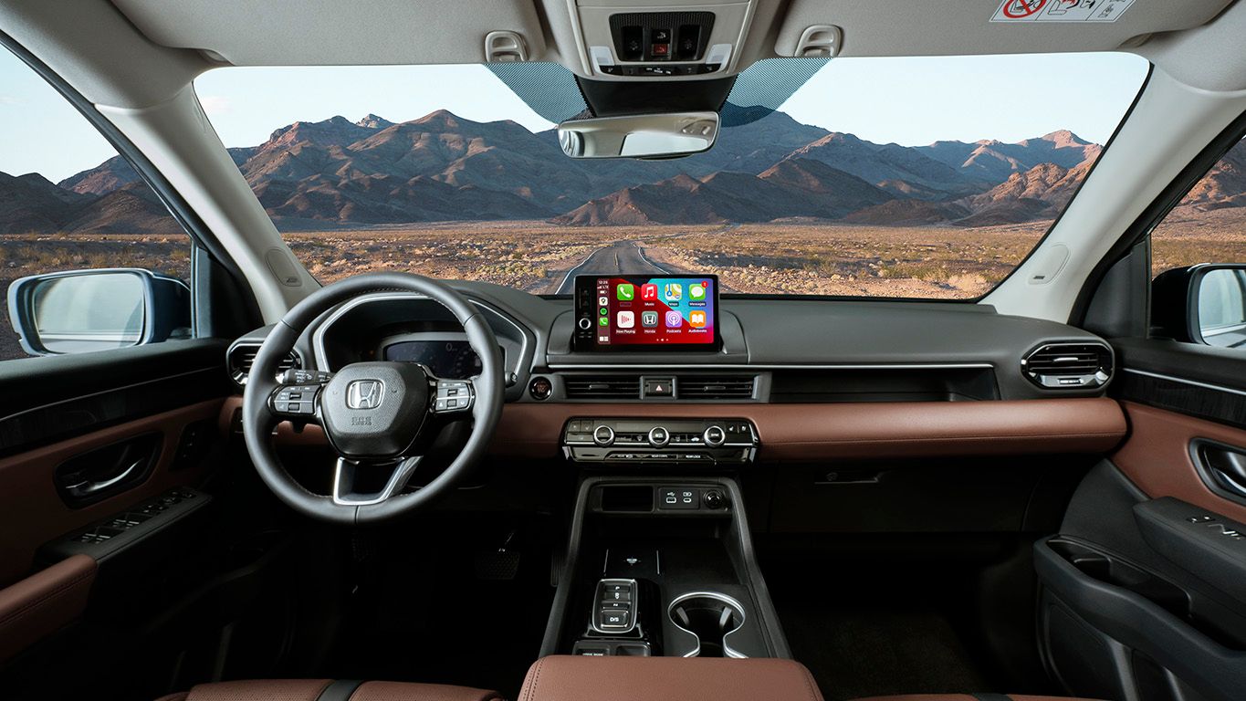 A sophisticated dashboard accented with beautiful detailing that holds important tech features.