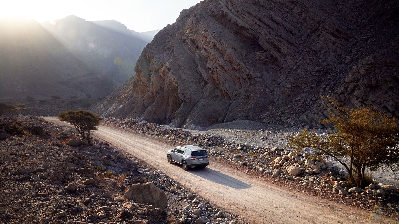 During high speed, if a driver makes a sudden steering movement to avoid an accident, the vehicle could flip over. To prevent this, braking is applied to the front and rear wheels individually, helping you to steer the car under complete control.