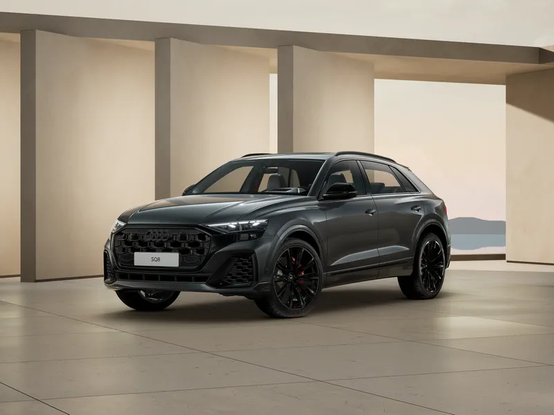 The Audi SQ8 offers Signature S exterior design elements, including quad exhaust tips and alu-optic mirror housings. Plus, a bold take on the  Singleframe® grille ensures a distinctive presence on the road.