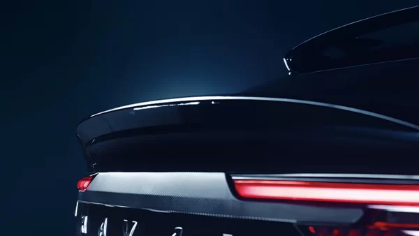 Double rear spoilers enhance downforce and stability at high speeds; optimized body reduces wind resistance.