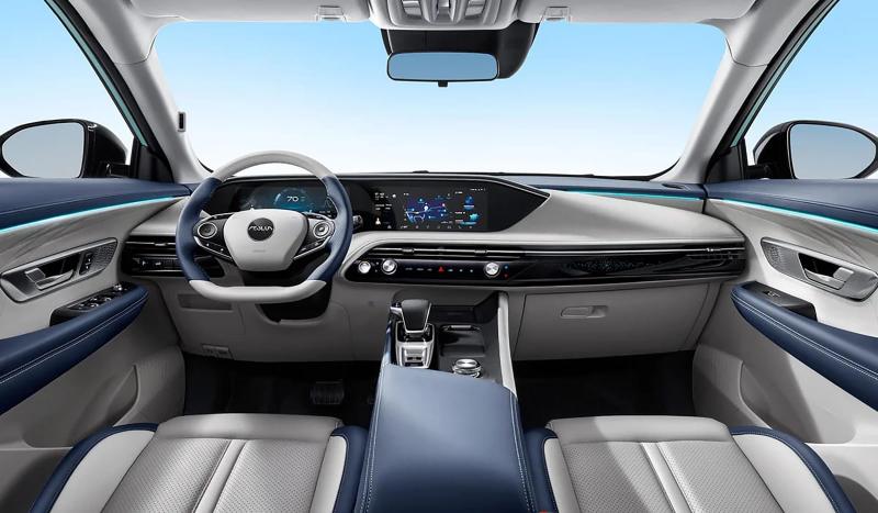 Soft-touch surfaces on the dash and doors, leather upholstery with contrast stitching, metallic trim accents, and piano-black finishes.
Multi-color LED ambient lighting running across the dashboard and doors, adjustable to match mood or driving mode.